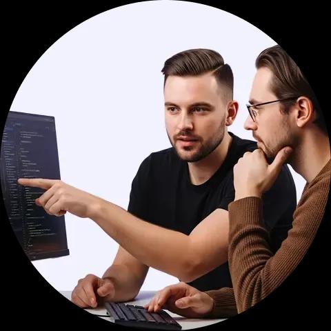 2 people are looking at desktop screen