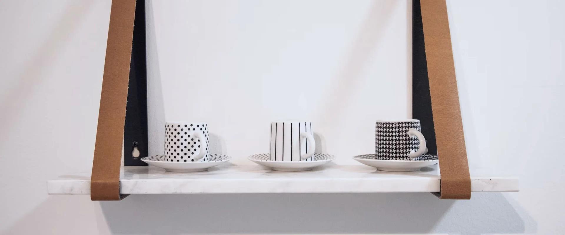 Wall shelf with three mugs