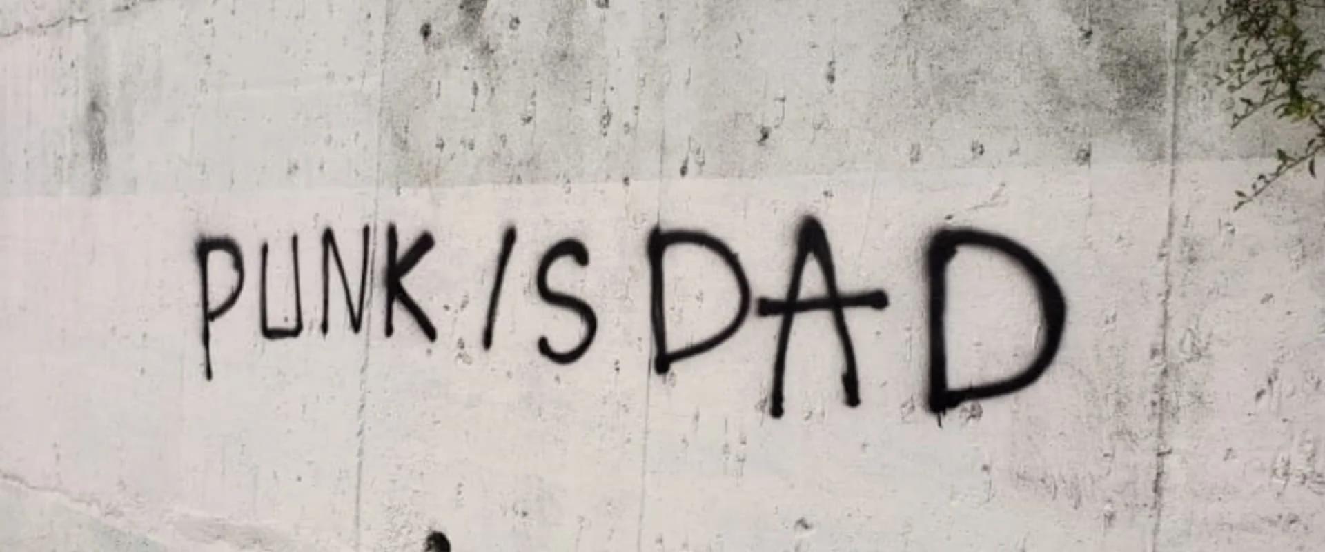 Graffiti on the wall, punk is dad