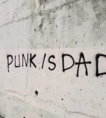 Graffiti on the wall, punk is dad